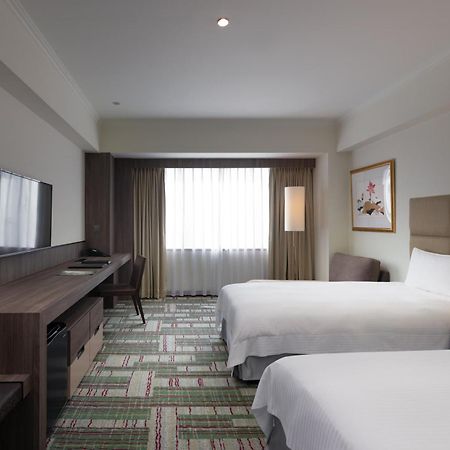 ฮาวาร์ด พลาซ่า โฮเต็ล Hotel เกาสง ภายนอก รูปภาพ Deluxe Twin Room