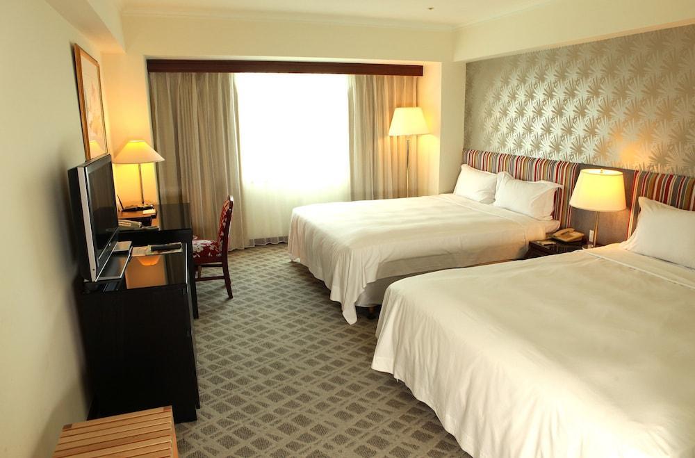 ฮาวาร์ด พลาซ่า โฮเต็ล Hotel เกาสง ภายนอก รูปภาพ A room at the hotel