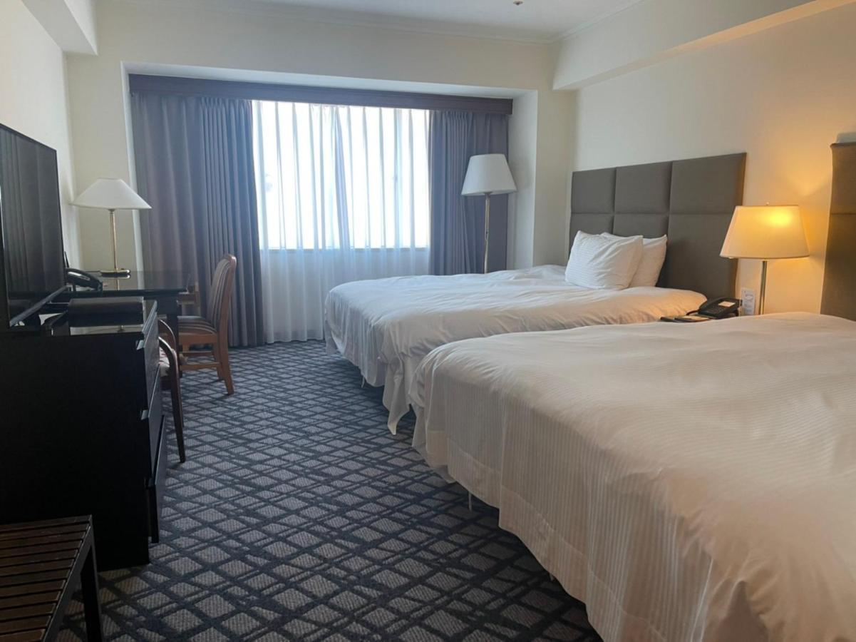 ฮาวาร์ด พลาซ่า โฮเต็ล Hotel เกาสง ภายนอก รูปภาพ A room at the hotel