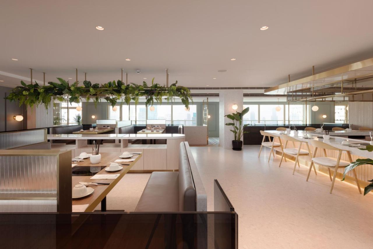 ฮาวาร์ด พลาซ่า โฮเต็ล Hotel เกาสง ภายนอก รูปภาพ The interior of the restaurant