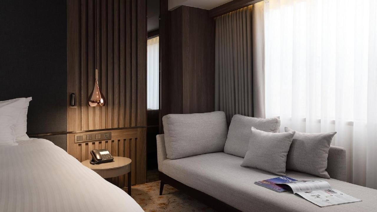 ฮาวาร์ด พลาซ่า โฮเต็ล Hotel เกาสง ภายนอก รูปภาพ A room at the hotel